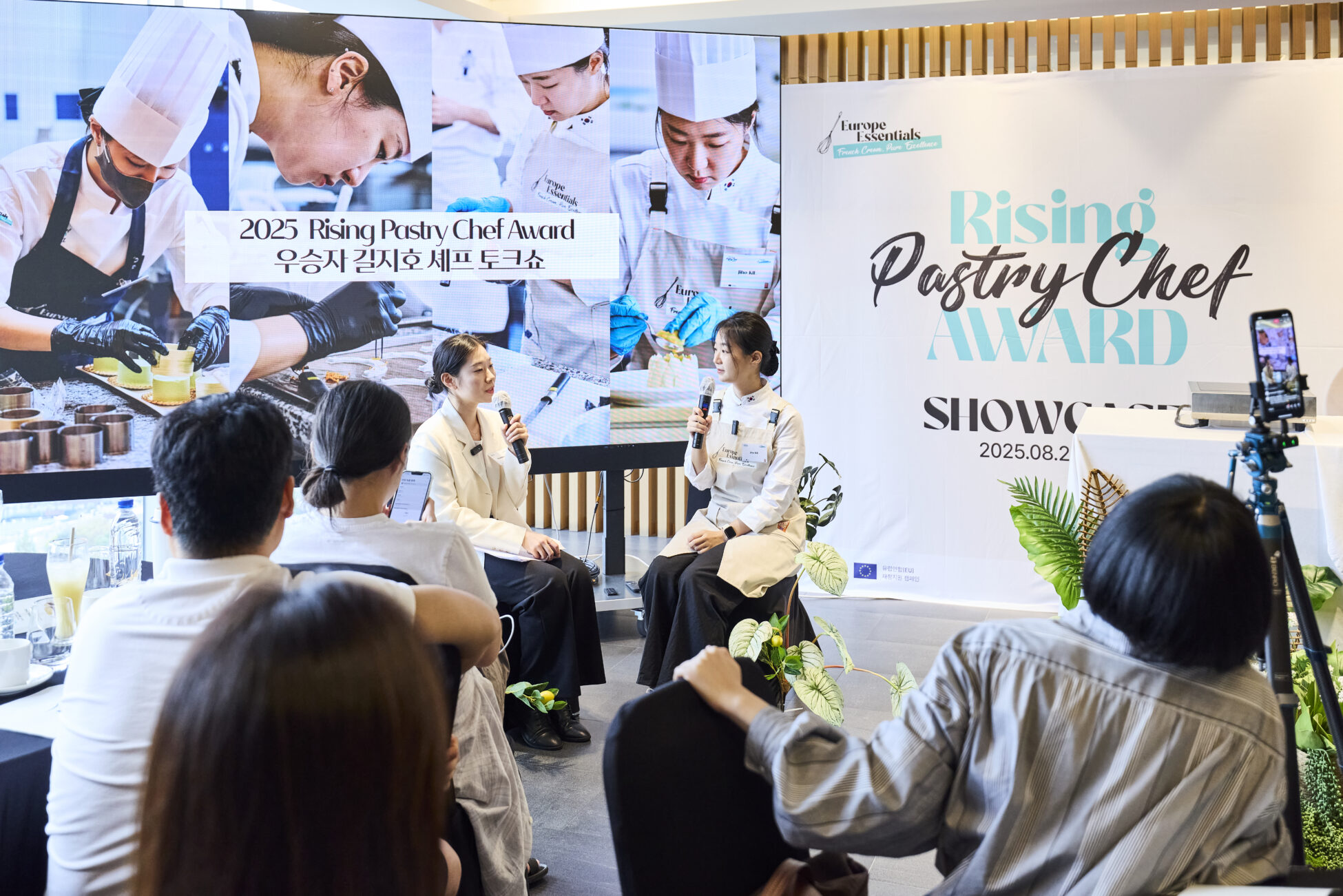 Pastry chef talking in front of small crowd