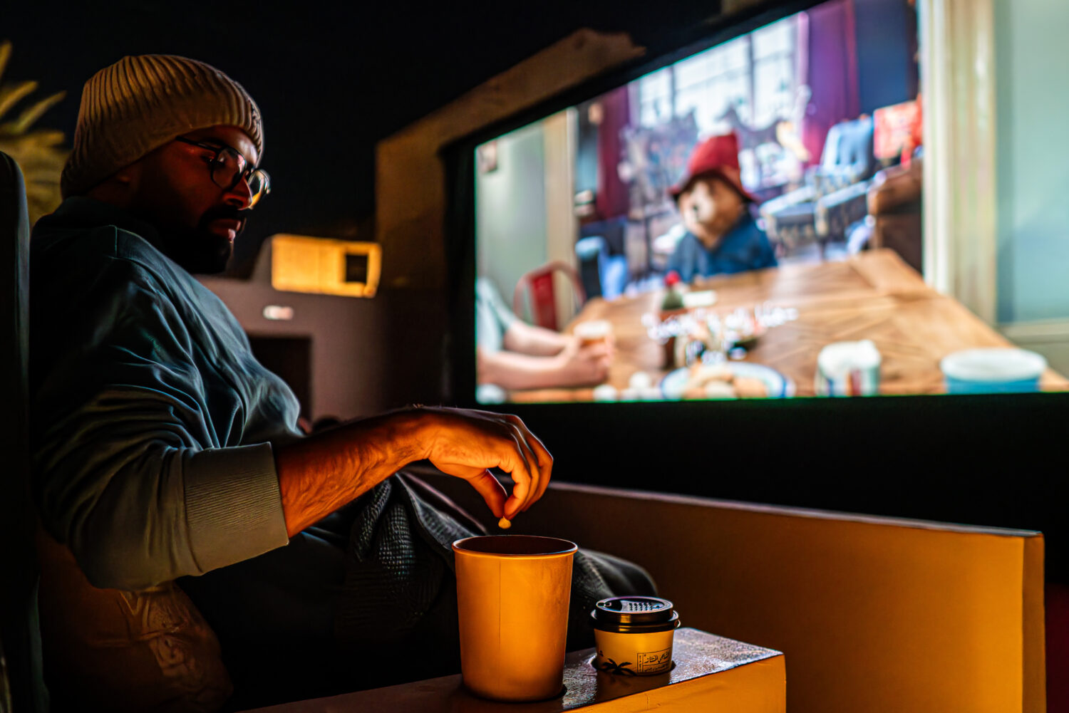 man with snacks at the cinema