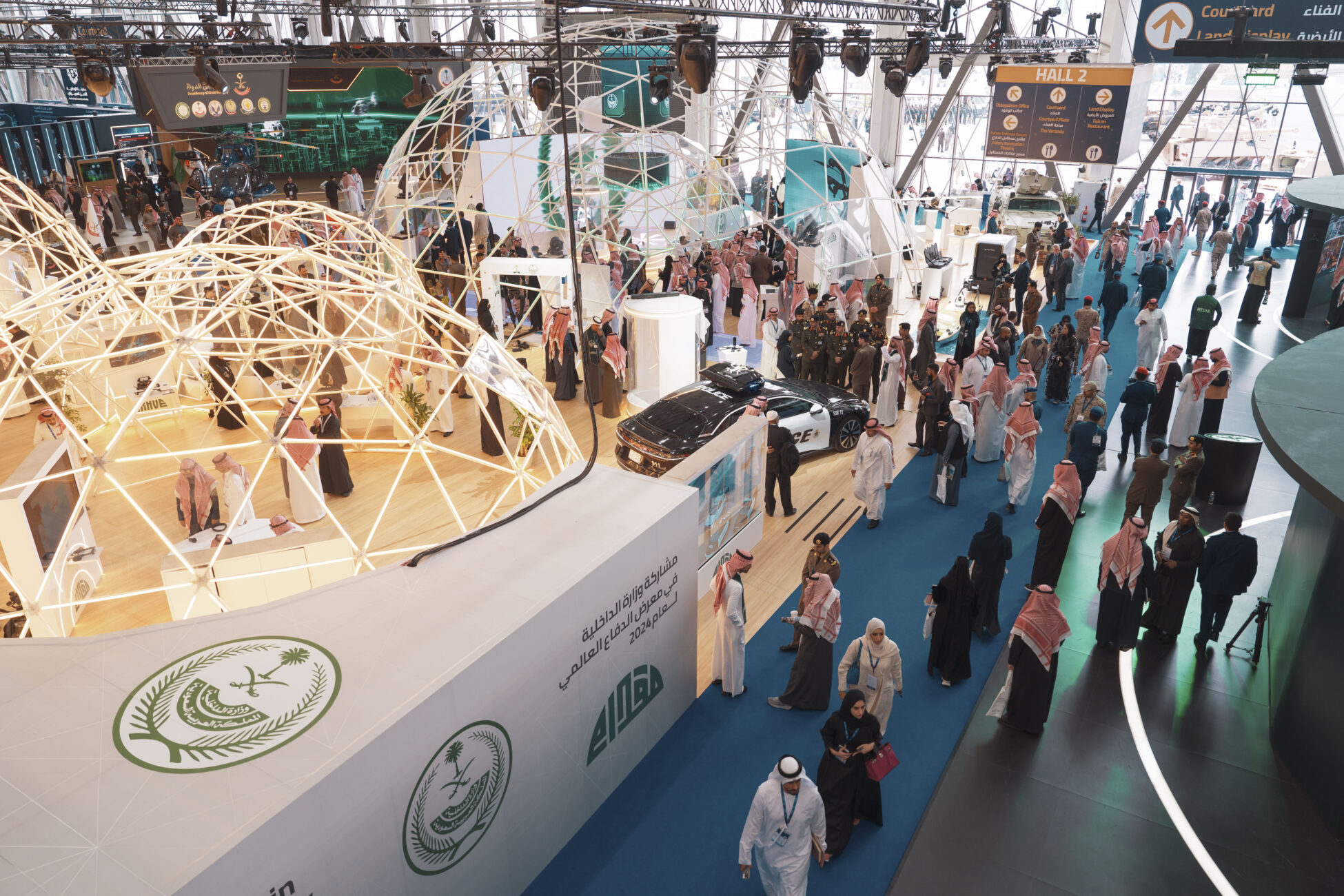 crowd seen from above at world defense show