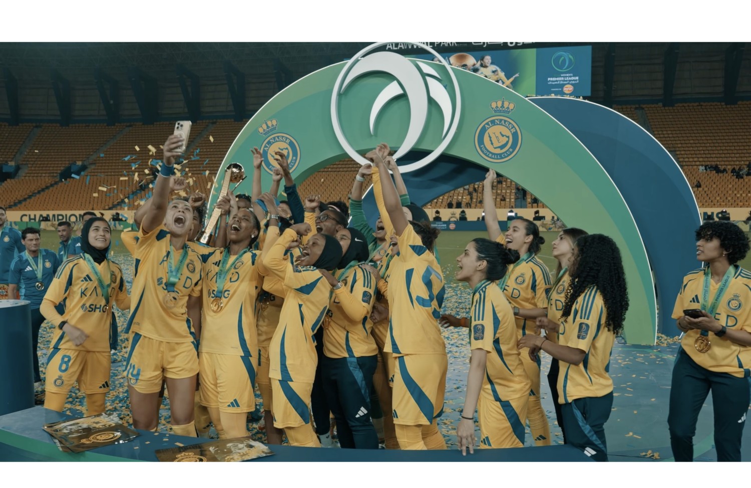 closeup of winning team celebrating, women football in middle east