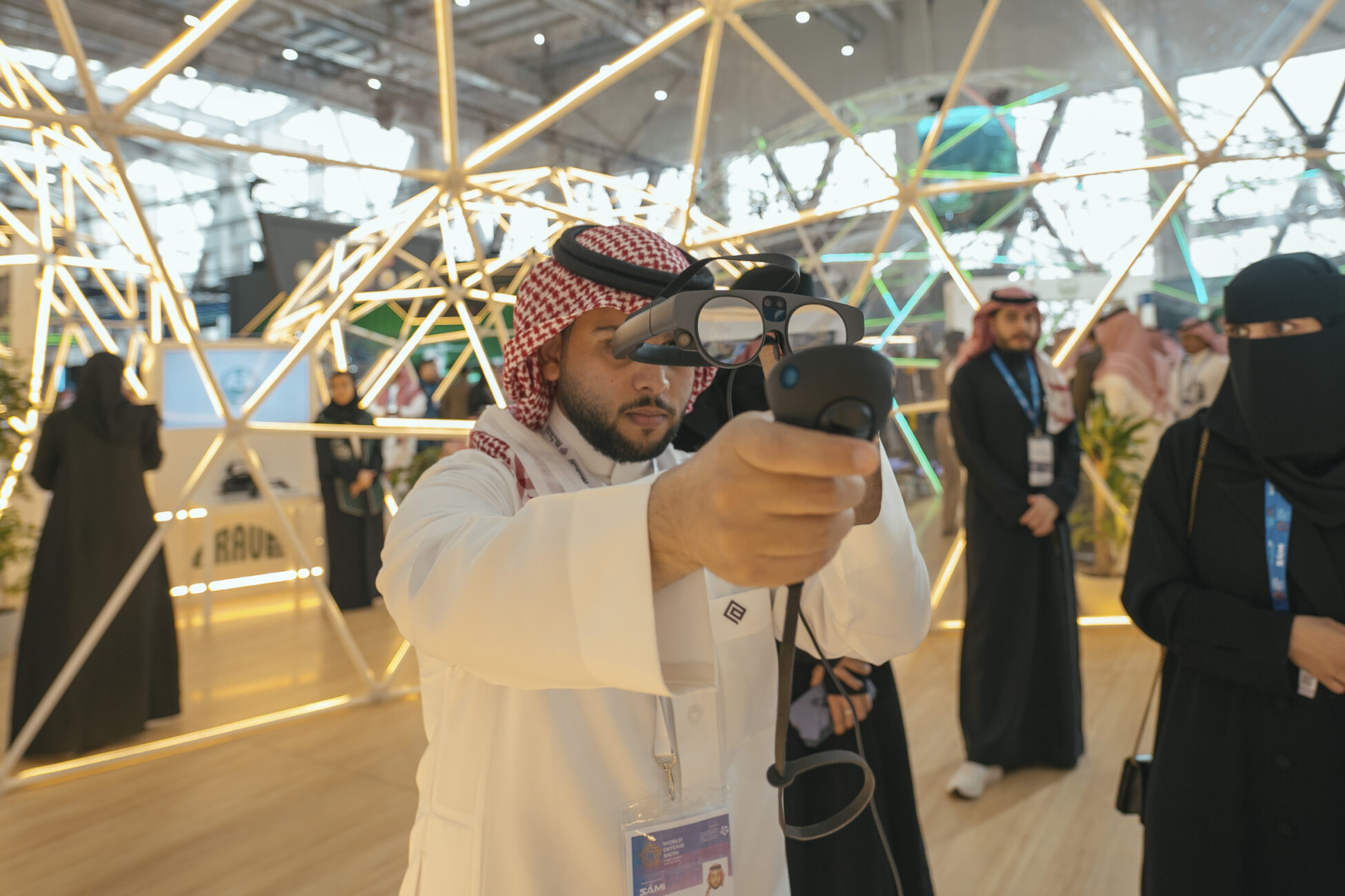 man testing high tech vituality glasses at world defense show